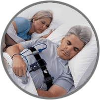 husband-in-bed-for-at-home-sleep-test-next-to-wife