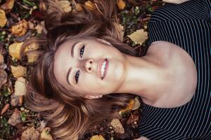 Photo by Konstantin Mishchenko: https://www.pexels.com/photo/a-beautiful-young-girl-lying-on-dry-leaves-9853849/