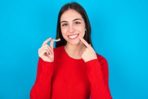 woman with clear aligner